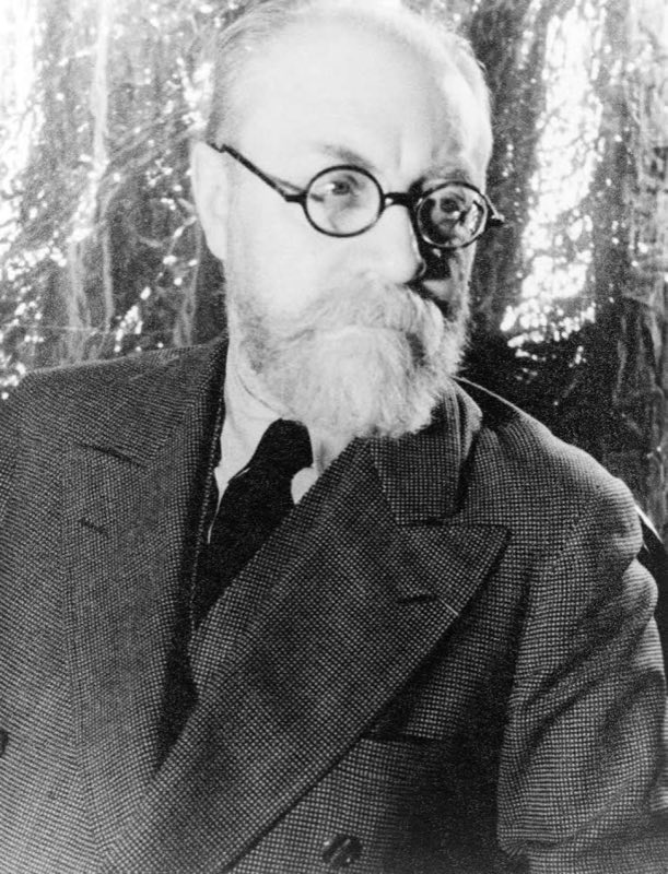 Henri Matisse in 1933, in glasses and a dark suit