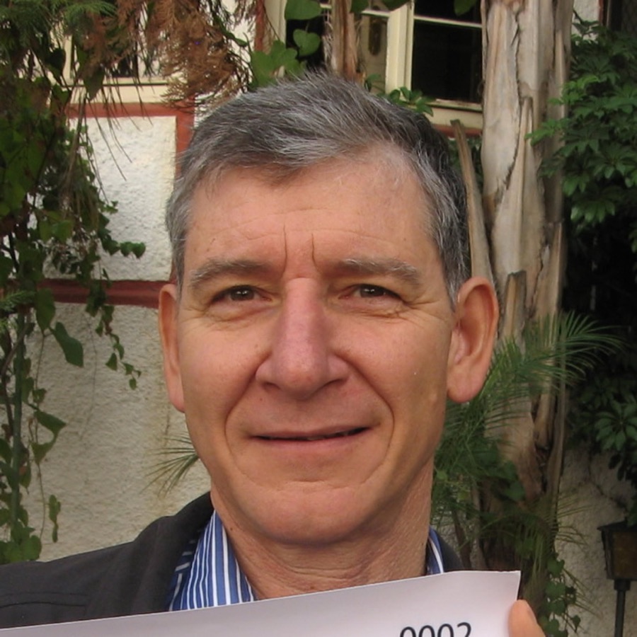 Tony Rinaudo in a field of young trees